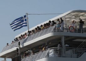 Holiday carnage with thousands left stranded & two dead after gale force winds batter Greece & shut down ferries