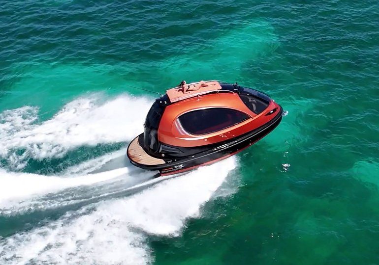 Watch futuristic jet ski CARAVAN hit the water in style complete with on board bar & sun deck but comes at a hefty price