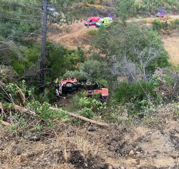 Two firefighters dead & three fighting for life after truck skids off road & plunges into ravine while on emergency call