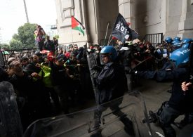 Pro-Palestine riots break out in Italy as metal ladders are thrown into windows & protesters storm iconic train station
