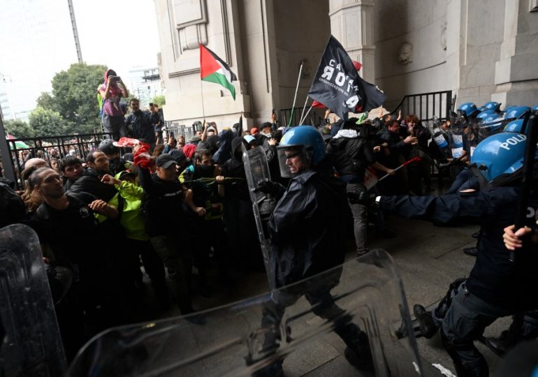 Pro-Palestine riots break out in Italy as metal ladders are thrown into windows & protesters storm iconic train station