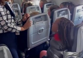 Shock moment ranting foul-mouthed passenger is strapped to seat with duct tape after ‘attacking crew’ on Vegas flight