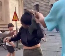 Shock moment ‘pregnant pickpocket’ is grabbed by her hair by husband who ‘spotted her stealing from his wife’
