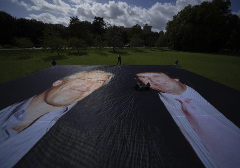 Trump and Epstein Banner Unveiled Outside Windsor Castle as Protesters Rally Against President’s U.K. State Visit