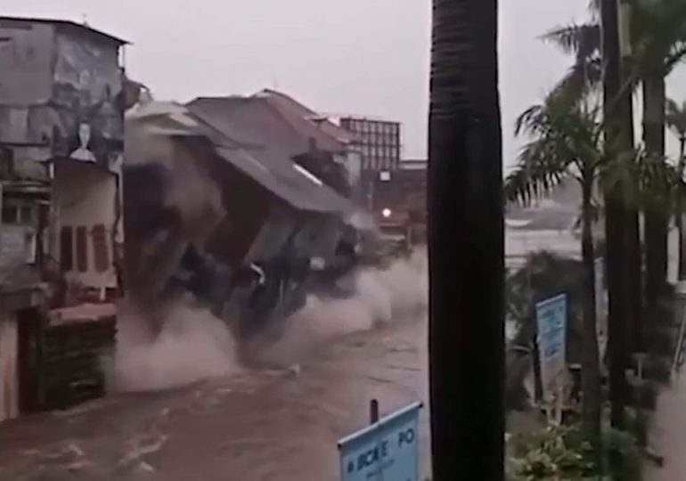 Horror floods smash Brit backpacker hotspot Bali as buildings swallowed up by torrents and at least six killed