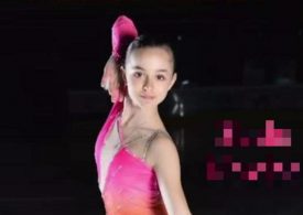 Aspiring figure skater, 15, killed after being hit by truck while waiting for school bus