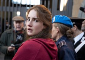 The Story Behind the Infamous ‘All You Need Is Love’ Shirt in The Twisted Tale of Amanda Knox