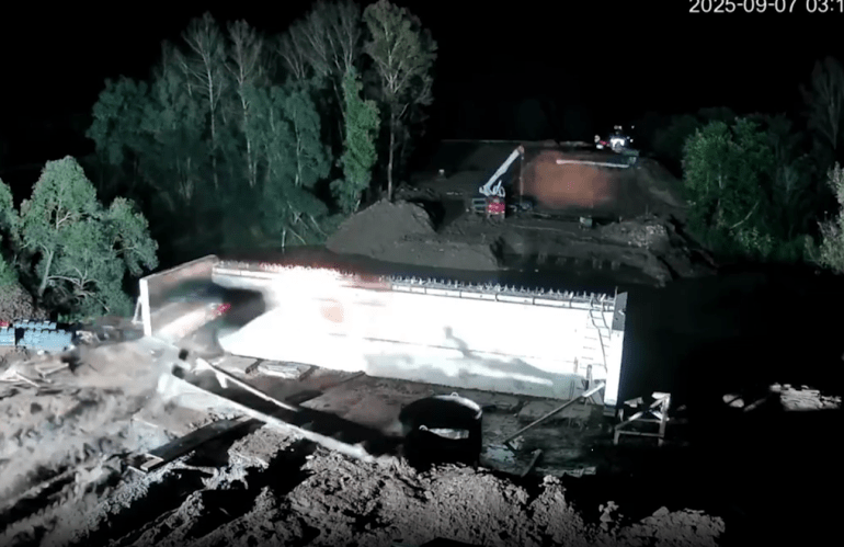 Shocking moment speeding car flies off unfinished bridge and EXPLODES in mid-air before plummeting into river