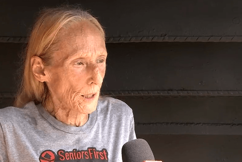 Horror moment grandmother forced to BITE rabid pitbull after it attacks her & her pet dog as stunned bystanders watch on