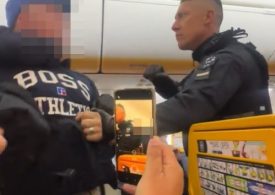 Shocking moment boozy Brit stag do yobs are dragged off Ryanair flight by armed cops after emergency landing