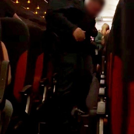 Watch moment ‘disruptive’ passenger clutching vodka is dragged off EasyJet flight to Greece after ’emergency landing’
