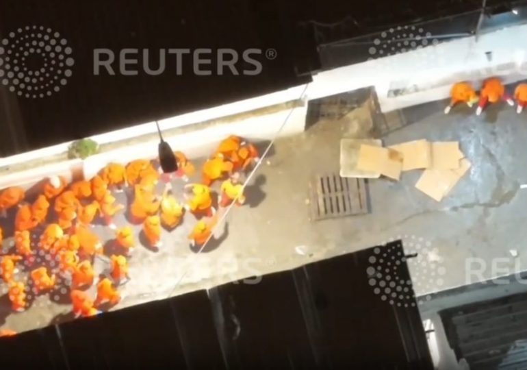 Dramatic POV footage shows moment armed cops storm Ecuadorian prison to CRUSH brutal riot that left at least 14 dead