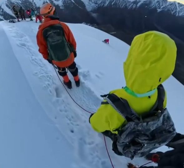 Chilling moment hiker, 31, plunges to his death from 18,000ft mountain after undoing safety rope to take selfie