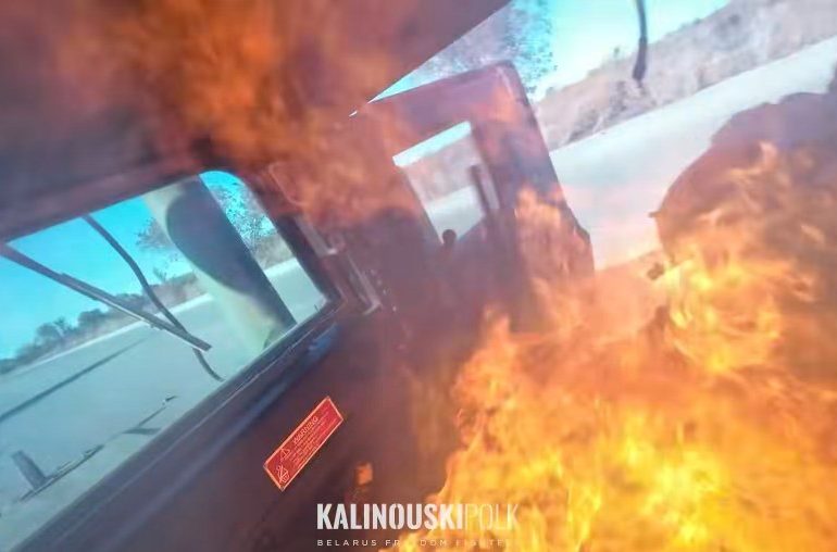 Terrifying moment Ukrainian soldiers ON FIRE dive from their speeding Humvee after drone strike