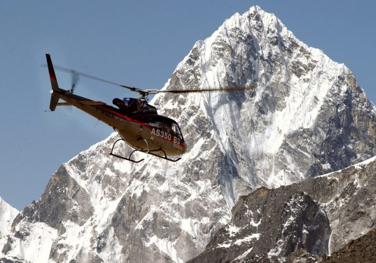 Nearly 1,000 people stranded on Mount Everest after massive snowstorm as rescuers race to reach camps