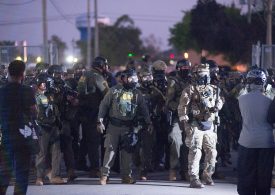 ‘Military-Style’ ICE Raid On Chicago Apartment Building Shows Escalation in Trump’s Crackdown