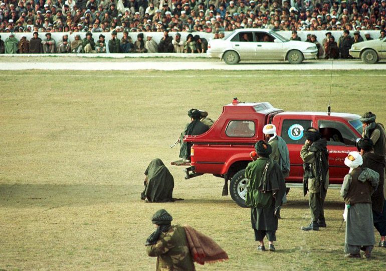 Taliban brings back stadium executions as murderer put to death in front of baying crowd after he killed pregnant wife