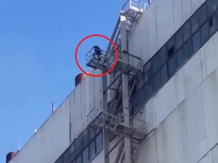 Dozens threaten mass suicide in Putin’s Russia over unpaid wages as strikers climb on roof & vow to throw themselves off