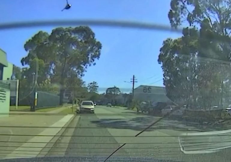 Horror video shows moment helicopter falls from sky and crashes down on top of car in Australia