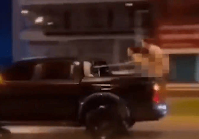 Russian blogger who romped while standing in the back of a speeding truck is BANNED from Thailand for life after stunt