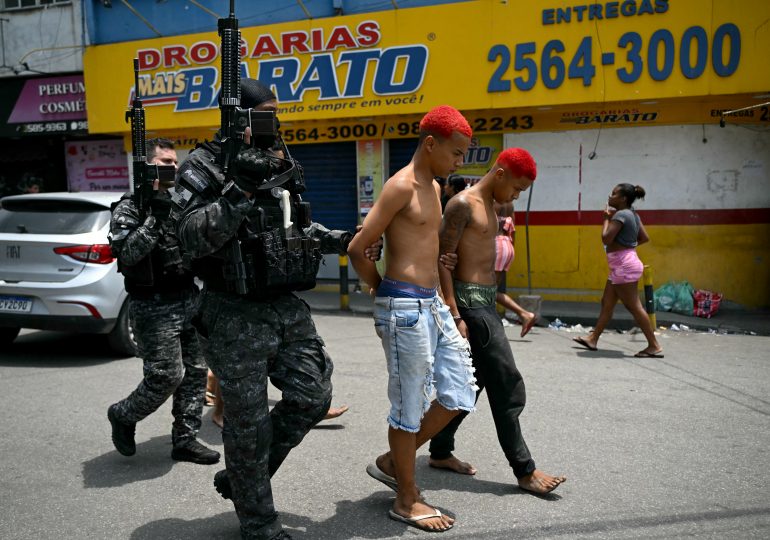 Rio cops ‘DECAPITATED teen gangster & hung head from tree’ in barbaric warning to Favela drug cartels as slum war erupts