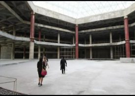 Look INSIDE mysterious abandoned ‘Hotel of Doom’ that’s never had a single guest & is only used as a giant TV screen