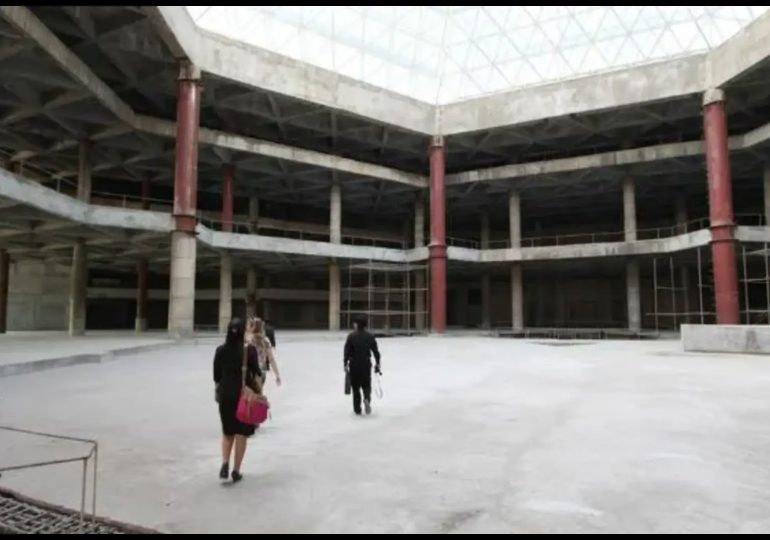 Look INSIDE mysterious abandoned ‘Hotel of Doom’ that’s never had a single guest & is only used as a giant TV screen