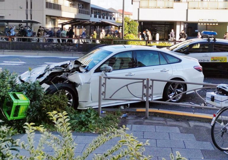 At least one dead and 10 injured as car ploughs through crowd in Tokyo before driver flees on foot