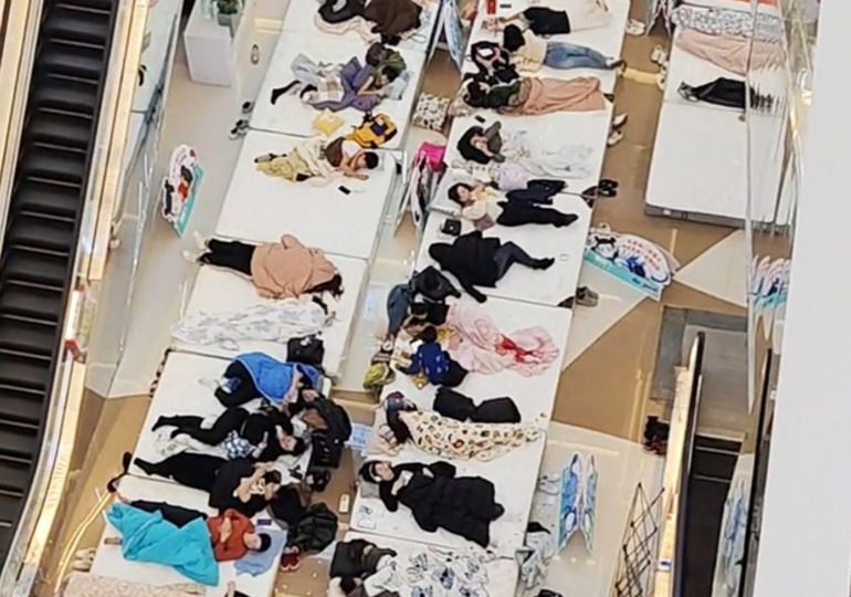 ‘World’s laziest man’ crowned after lying still for 33hours while wearing a NAPPY in bizarre ‘lie flat’ competition