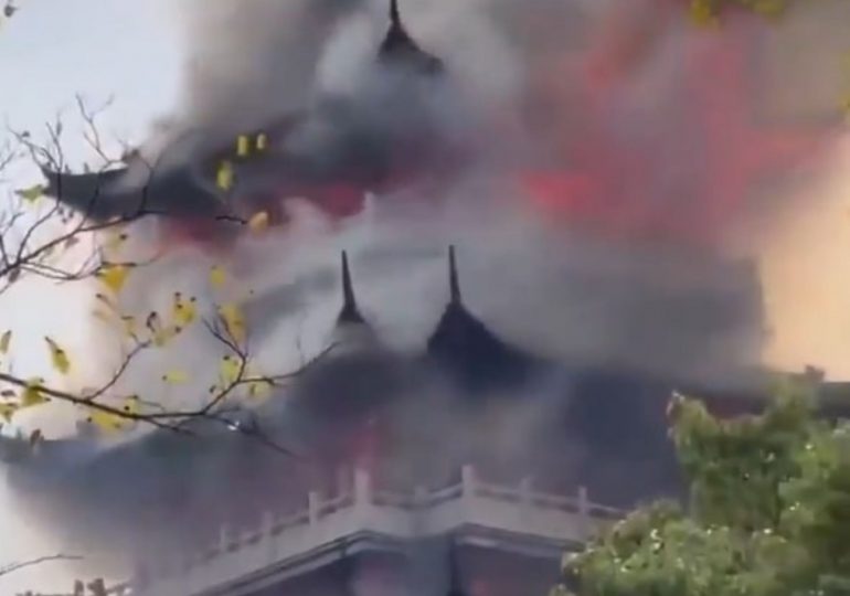 Tragic moment huge blaze engulfs temple after ‘irresponsible’ tourist is blamed for wrongly using a candle