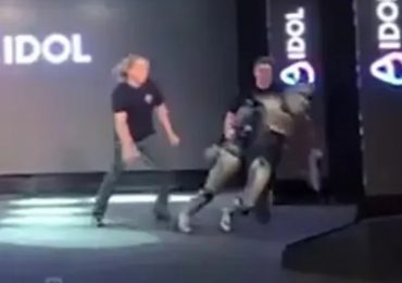 Humiliating moment Russia’s new humanoid robot collapses on stage after staggering just a few steps at grand unveiling