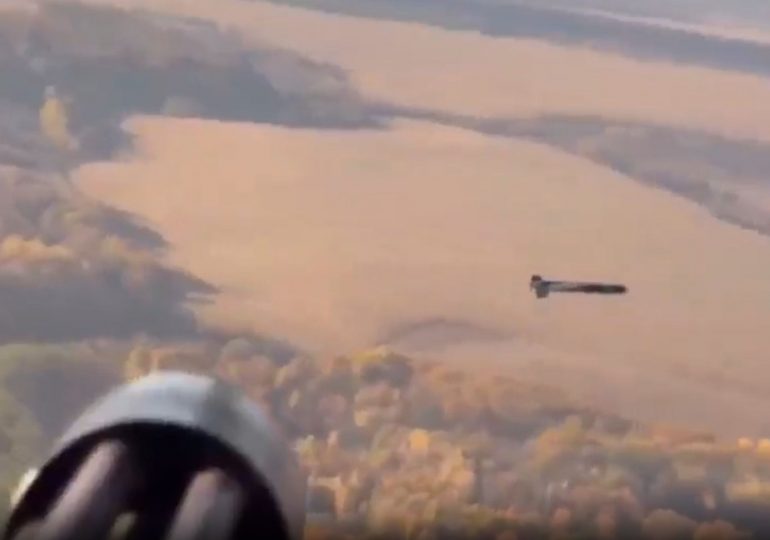 Stunning moment Ukrainian helicopter shoots down Russian drone mid-air with fast-firing minigun blitz