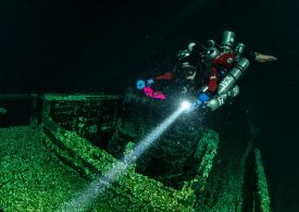 Mystery as divers stumble on 200-year-old shipwreck still perfectly preserved with its mast still standing