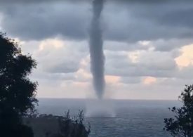 Horror moment giant waterspout TORNADO strikes just yards off top holiday hotspot beach