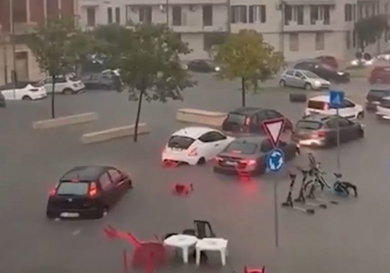 Storm-battered holiday hotspot hit by floods as dramatic vid shows deluge turn streets into rivers and cars submerged
