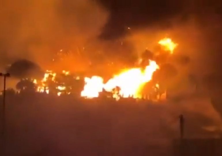 Horror footage shows massive fire sweep through town burning 170 homes and killing at least one in Japan