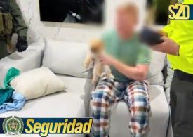 Brit ‘gangsters’ working for ‘Irish Mafia’ arrested by heavily-armed Colombian cops – as one nicked cuddling his dog