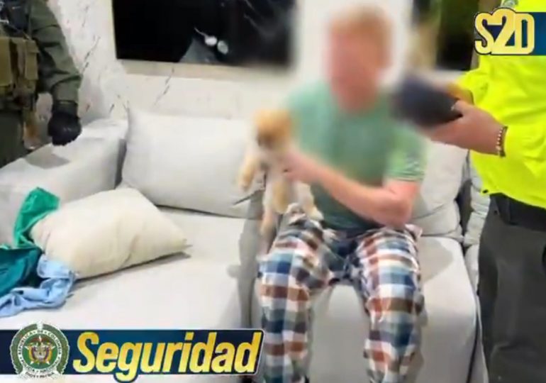 Brit ‘gangsters’ working for ‘Irish Mafia’ arrested by heavily-armed Colombian cops – as one nicked cuddling his dog