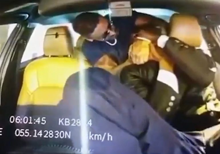 Horrifying moment taxi driver put in CHOKEHOLD by passenger who threatened to kill him & groped him mid-ride in Dubai