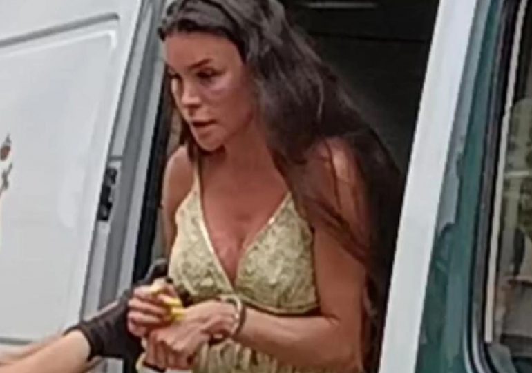 Moment married woman, 37, accused of sexually assaulting teen tourist in Magaluf hotel steam room is led away in cuffs