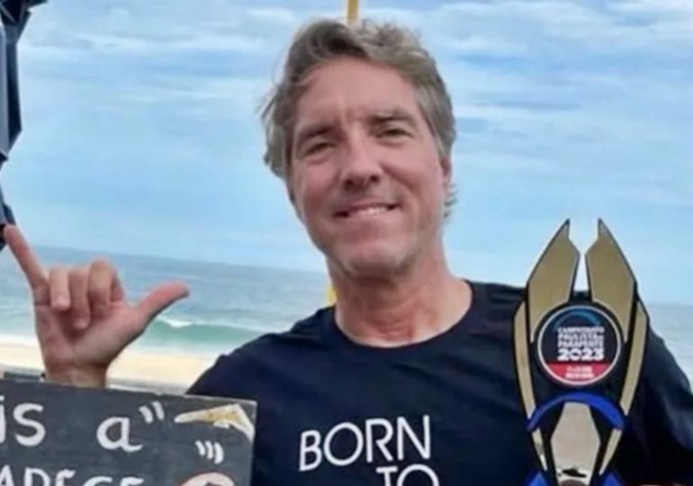 Two-time champion hang glider, 59, dies after mid-air crash sent him slamming into building in 11-storey plunge 