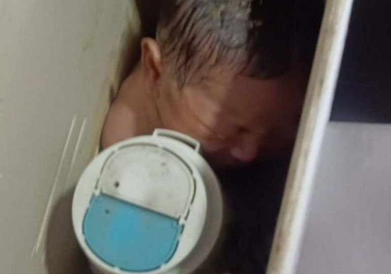 Newborn baby found abandoned in office toilet by cleaner who heard deserted girl’s cries just in time