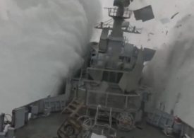 Stunning moment Nato submarine torpedoes frigate in exercise as ship erupts into the air & containers fall off