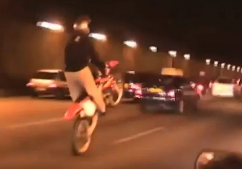 Louvre heist suspect is ex-museum guard and joyriding biker influencer who was filmed popping wheelies on Champs Elysee