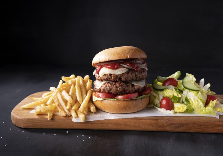 Diner, 22, fights for life after trying to swallow an entire burger whole ‘for a joke’ leaving him in intensive care