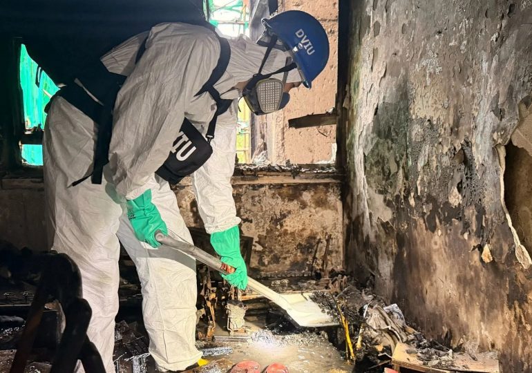 Devastating first pictures show inside fire-ravaged tower blocks in Hong Kong after inferno left at least 146 dead