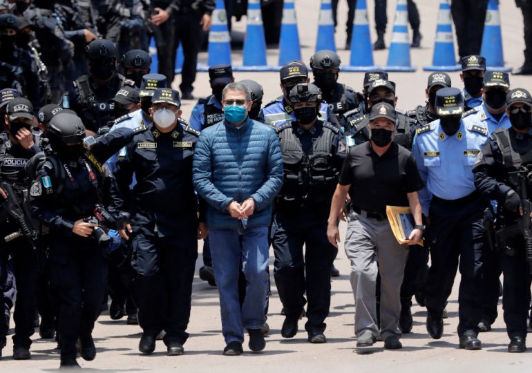 As Trump Threatens to Bomb Venezuela’s Maduro for Trafficking Drugs, He Pardons an Ex-President Convicted in a Drug Case