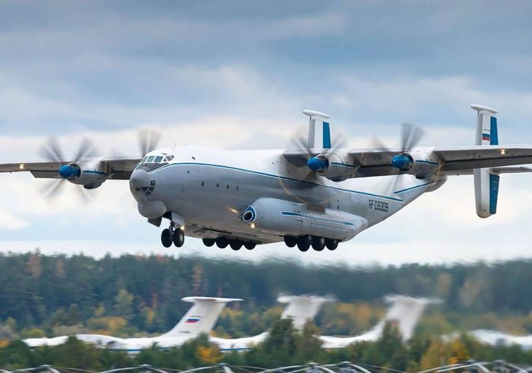 Russian military plane plunges into reservoir after ‘falling apart mid-air’ as rescue crews hunt for crash survivors