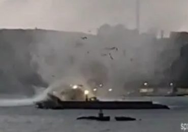 Moment waterspout TORNADO smashes Spanish tourist seafront damaging pleasure boats & sending restaurant furniture flying