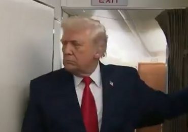 Bizarre moment Trump is HIT with bathroom door on Air Force One by bungling staff – but his reaction is hilarious